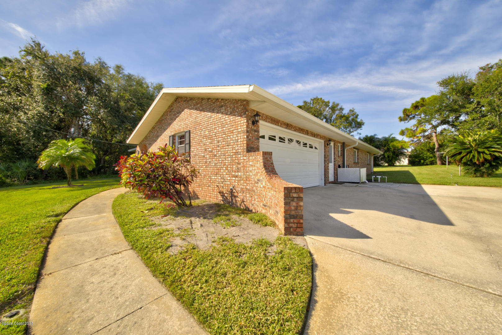 1030 Sunswept Road Northeast Palm Bay, FL 32905 - Photo 5 of 39 two car garage