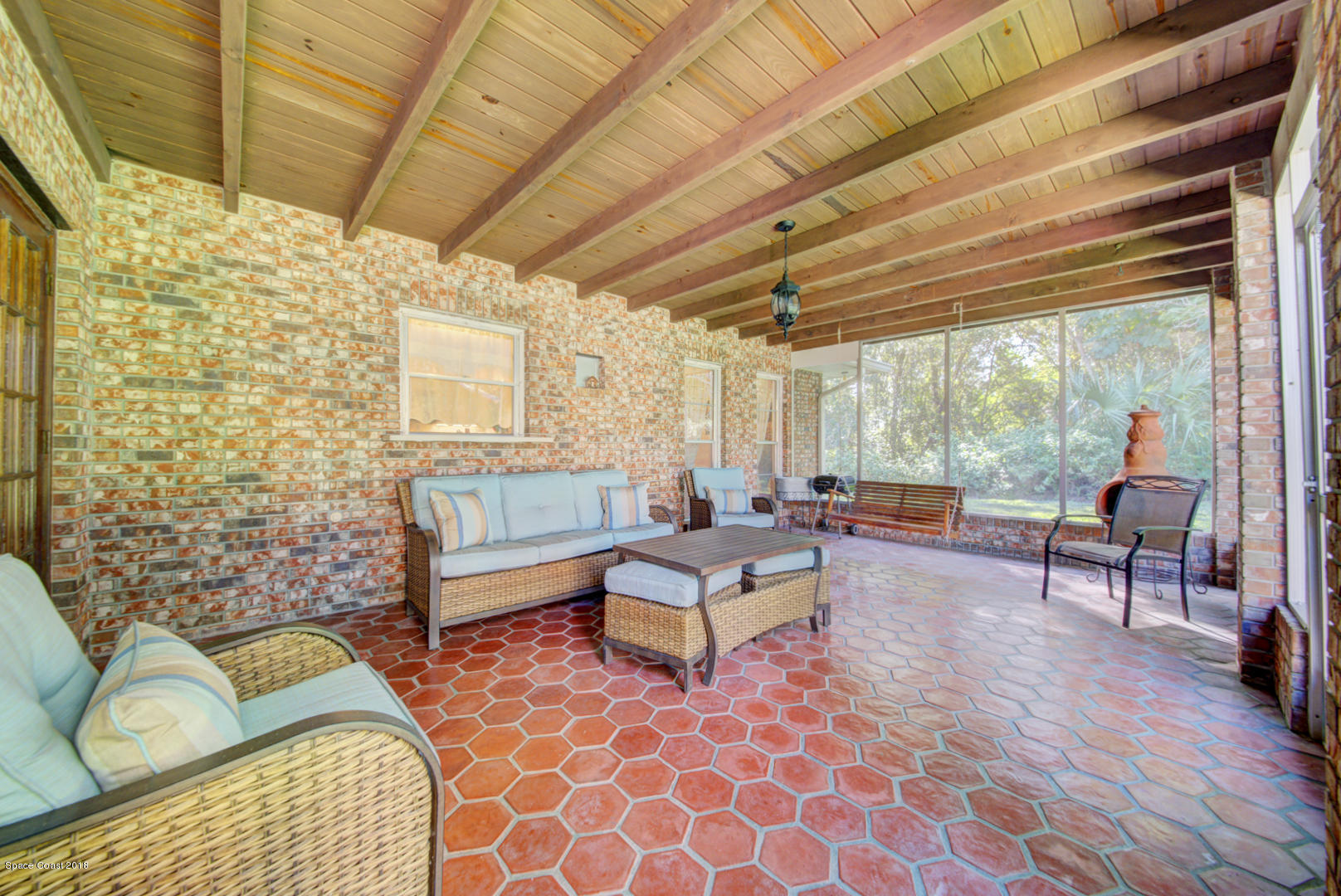 1030 Sunswept Road Northeast Palm Bay, FL 32905 - Photo 6 of 39 back porch with brick detail
