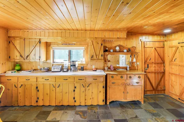 a view of a kitchen with a sink