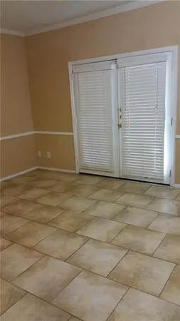 a kitchen with a sink stove and refrigerator