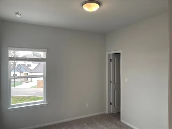 a view of a livingroom with a window
