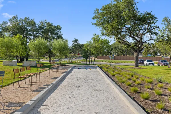 a view of park with large trees