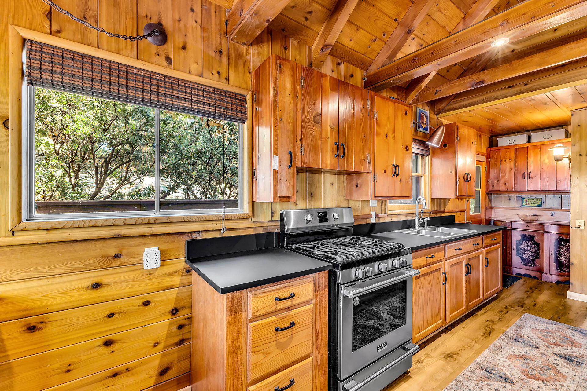 52646 Chickadee Lane Idyllwild, CA 92549 - Photo 17 of 73 a kitchen with stainless steel appliances granite countertop a stove and a sink