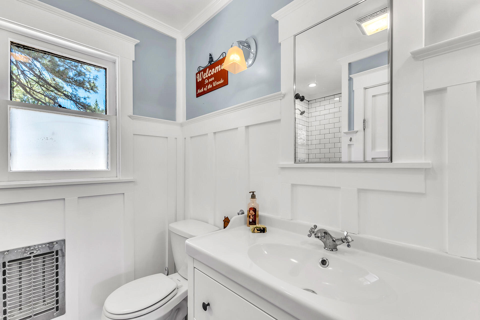 52646 Chickadee Lane Idyllwild, CA 92549 - Photo 31 of 73 a bathroom with a sink mirror and toilet