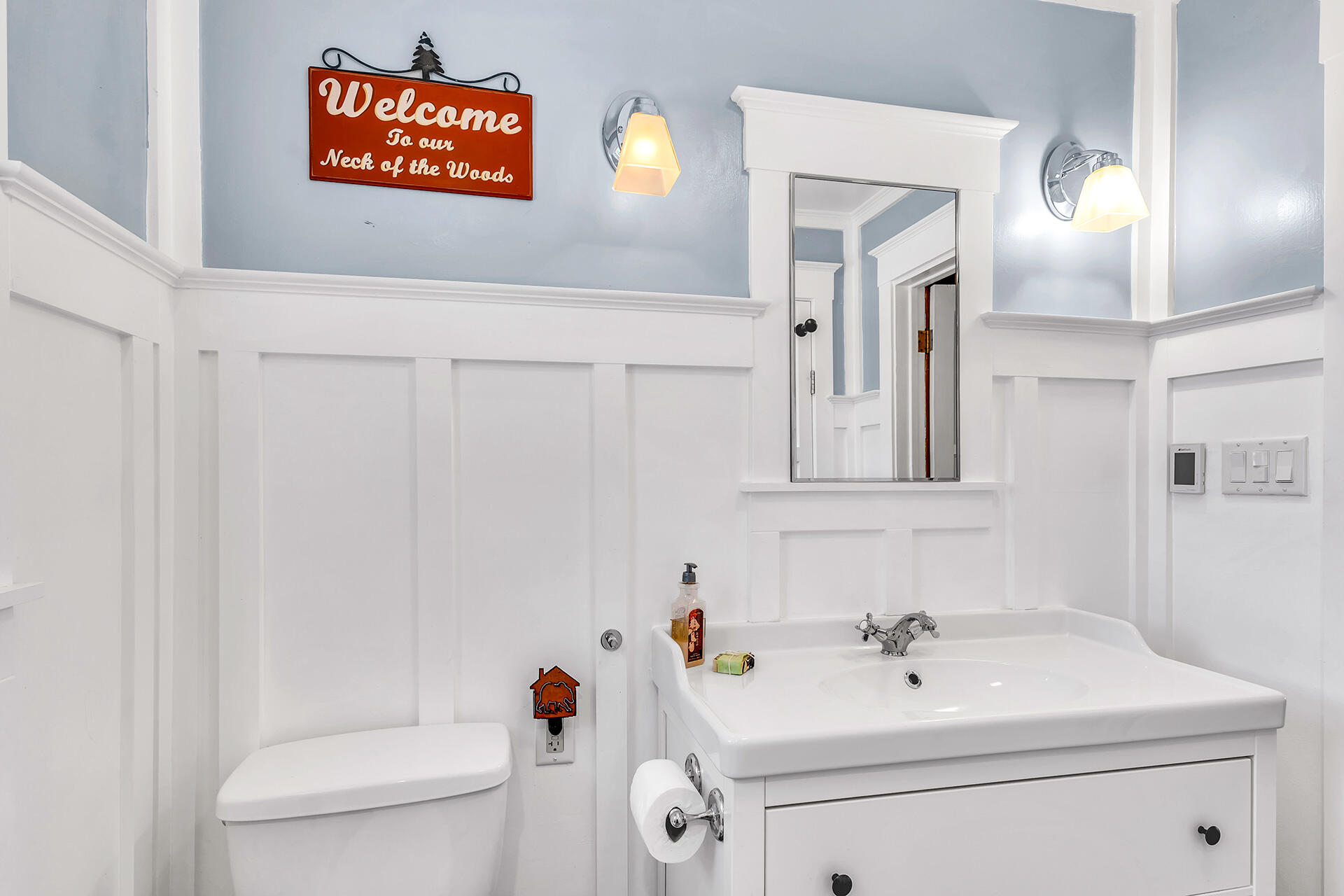 52646 Chickadee Lane Idyllwild, CA 92549 - Photo 32 of 73 a bathroom with a sink a toilet and a mirror