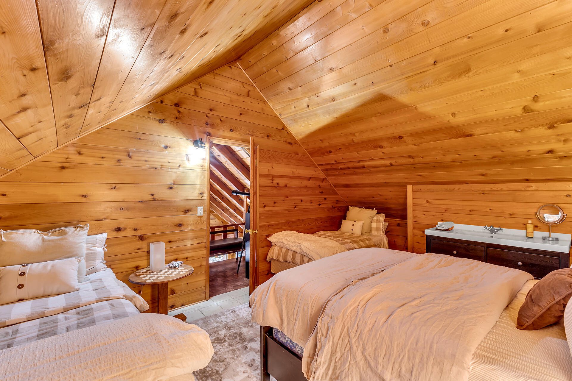 52646 Chickadee Lane Idyllwild, CA 92549 - Photo 45 of 73 a couple of chairs sitting in a bedroom next to a yard