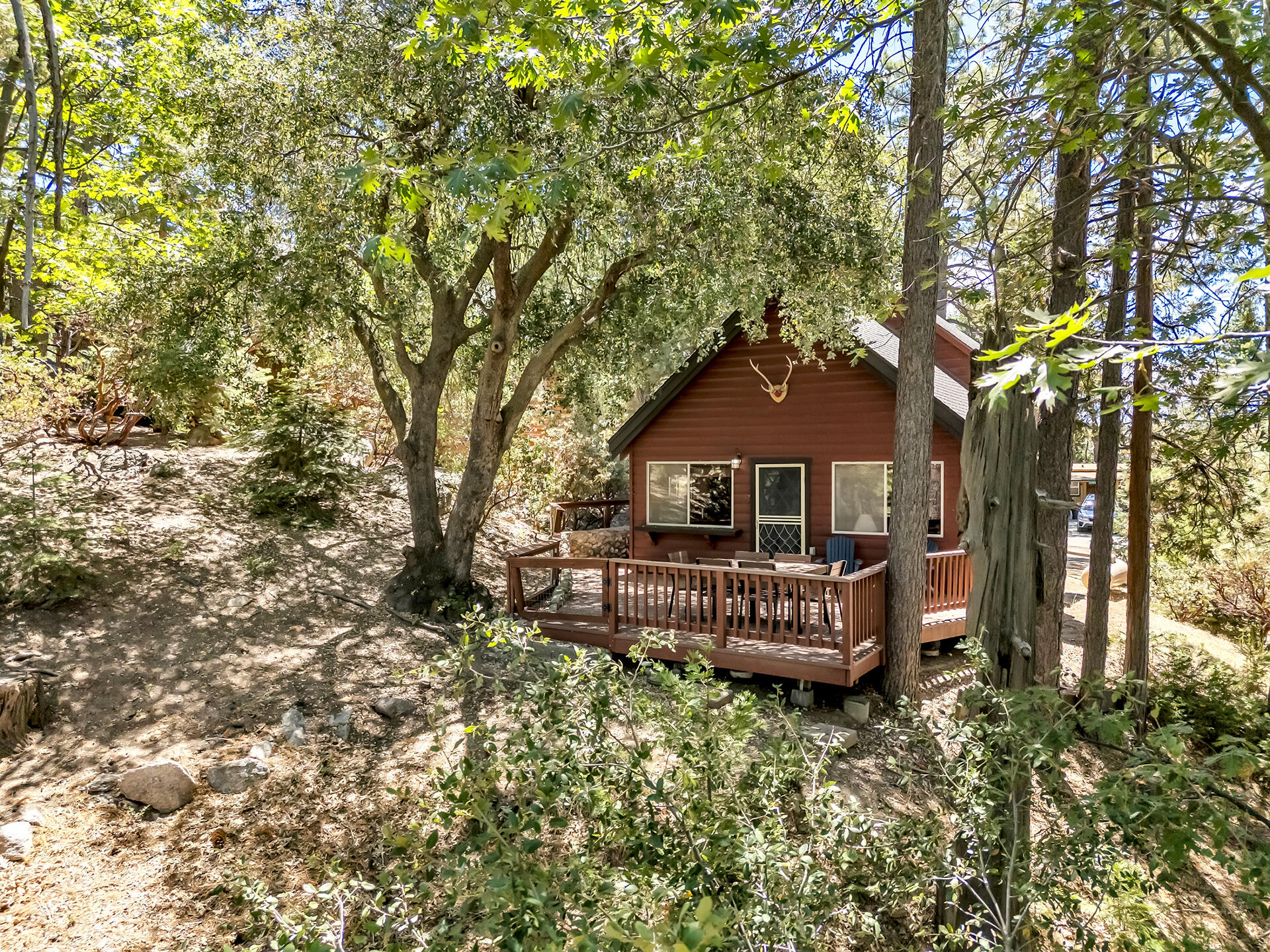 52646 Chickadee Lane Idyllwild, CA 92549 - Photo 64 of 73 a front view of a house with a garden and deck