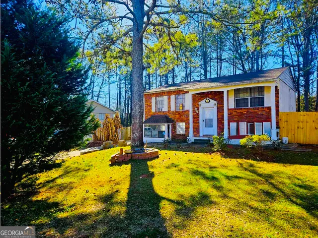 a front view of a house with swimming pool