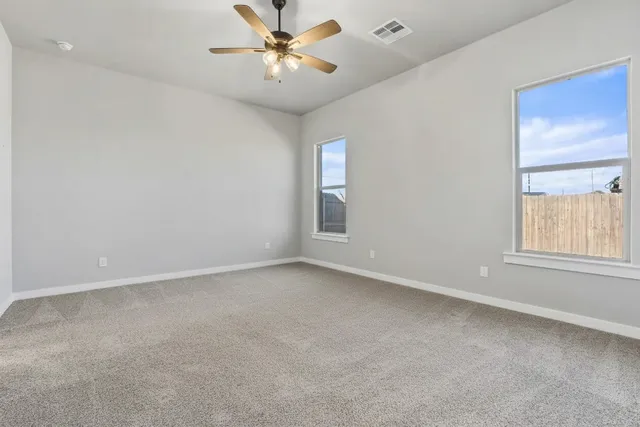 a view of an empty walk in closet