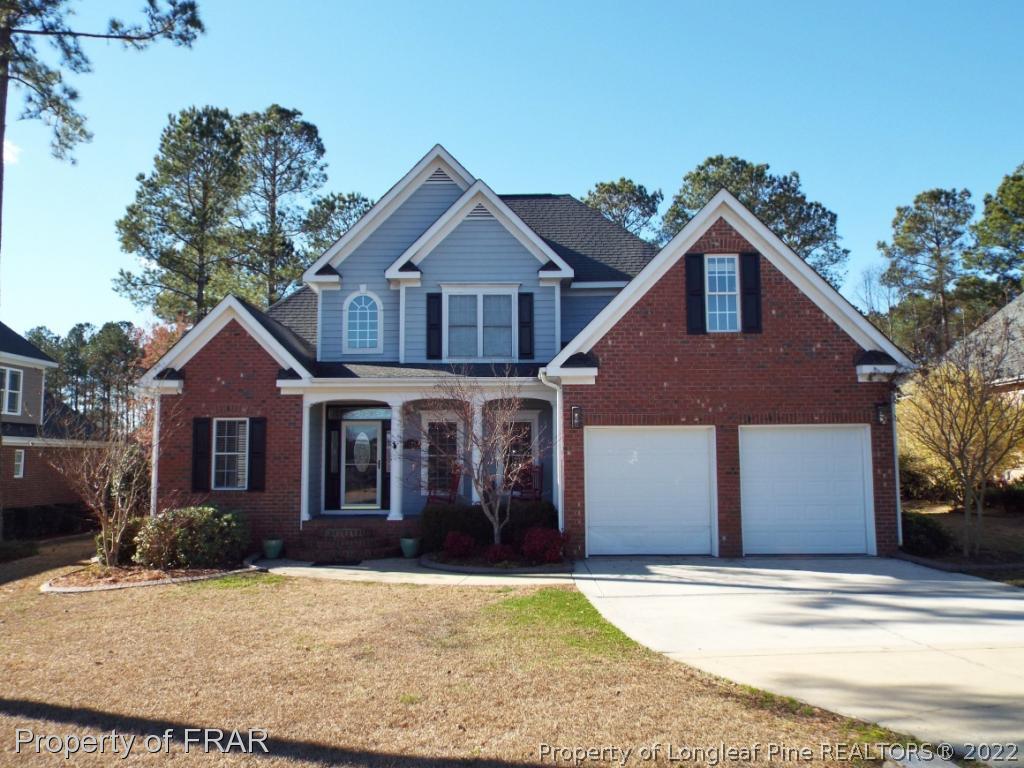 239 Falling Water Road Spring Lake, NC 28390 - Photo 1 of 36 a front view of a house with a yard