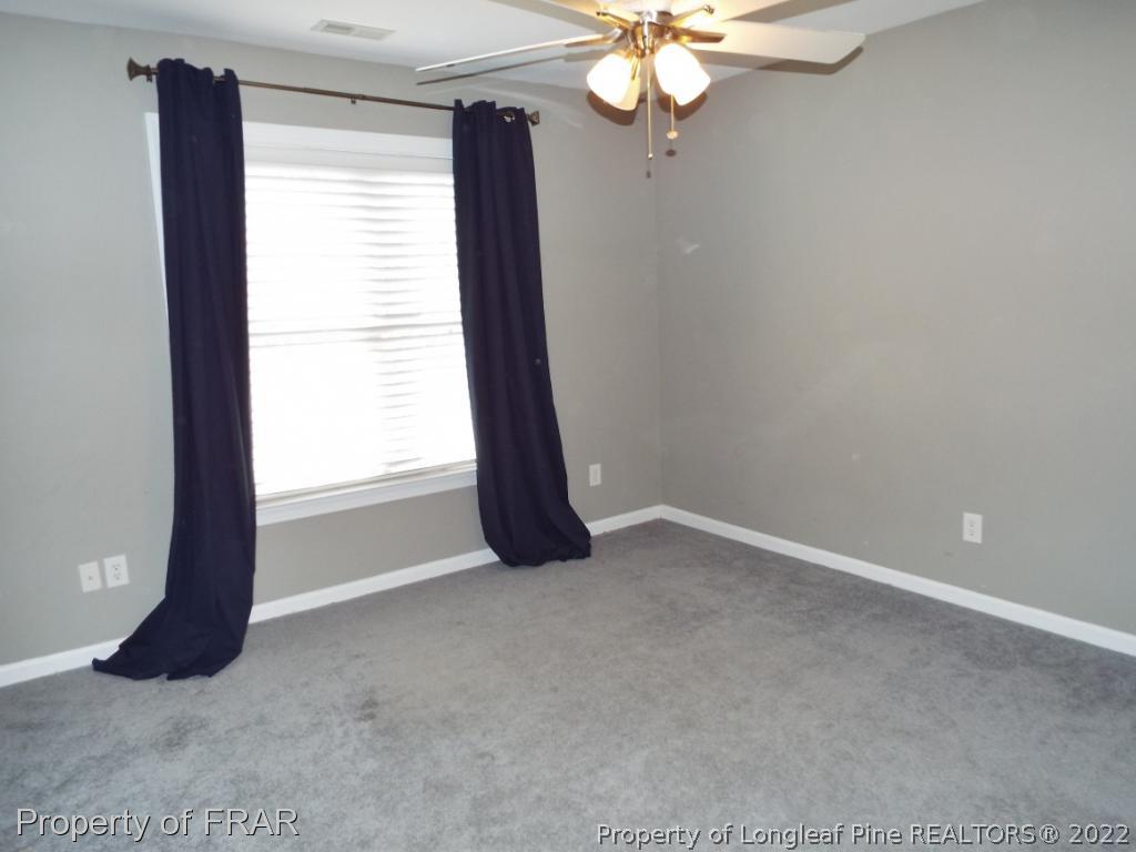239 Falling Water Road Spring Lake, NC 28390 - Photo 32 of 36 an empty room with a window