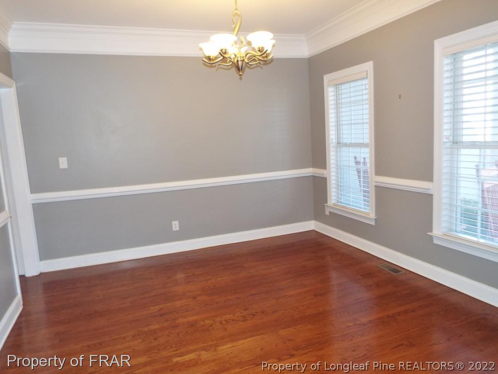 239 Falling Water Road Spring Lake, NC 28390 - Photo 8 of 36 a view of an empty room with a window
