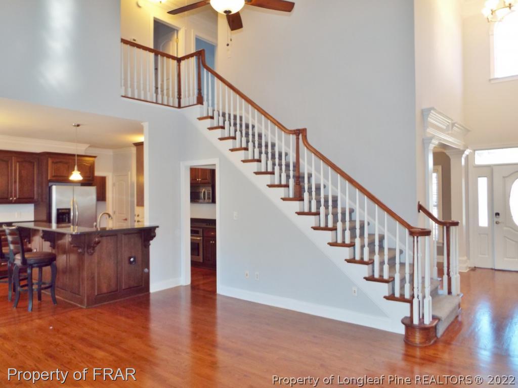 239 Falling Water Road Spring Lake, NC 28390 - Photo 10 of 36 a view of entryway and hall with wooden floor