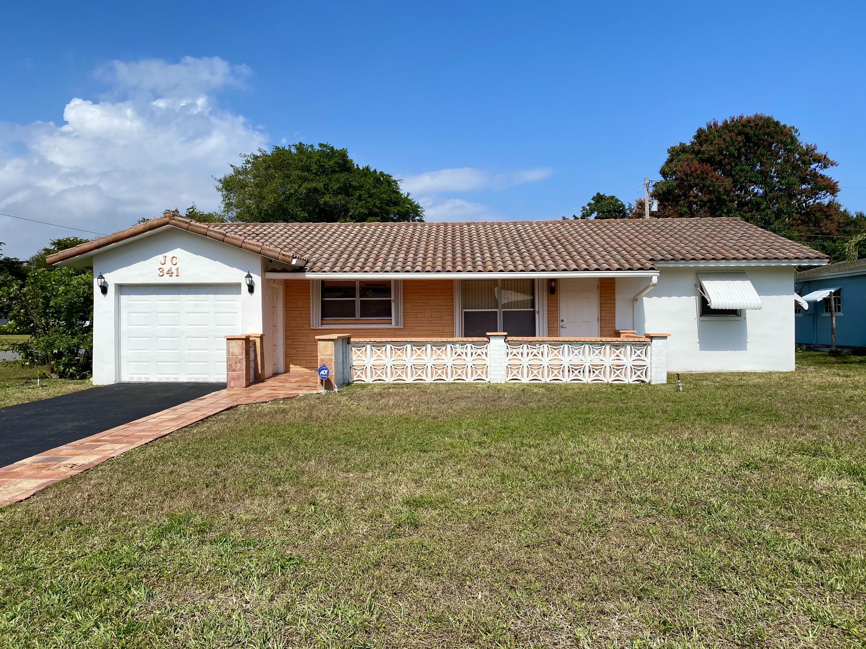 341 Northwest 21st Street Boca Raton, FL 33431 - Photo 1 of 28 Front