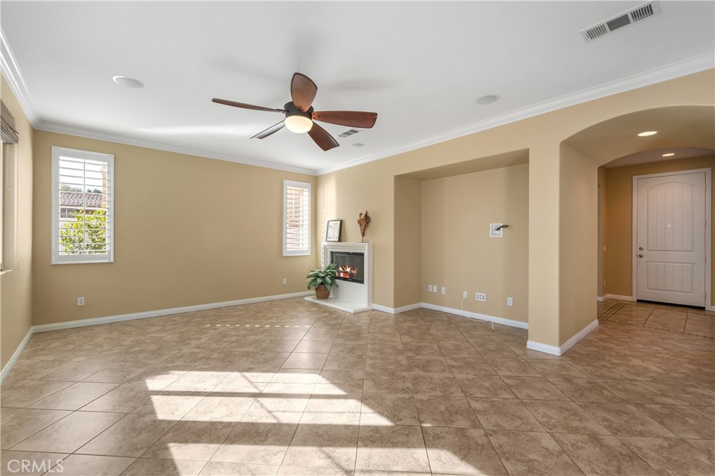 28817 Edenton Way Temecula, CA 92591 - Photo 18 of 56 a view of livingroom with hardwood floor and a ceiling fan