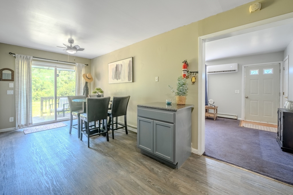 66 Great Road Shirley, MA 01464 - Photo 11 of 40 a view of a livingroom with furniture wooden floor and a window