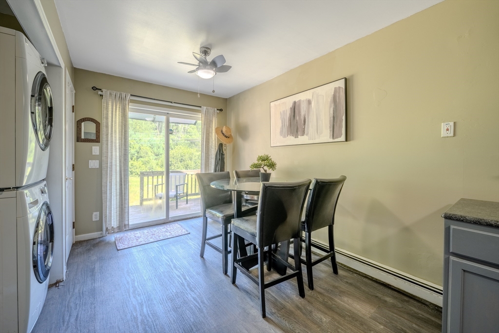 66 Great Road Shirley, MA 01464 - Photo 12 of 40 a view of a dining room with furniture window and wooden floor