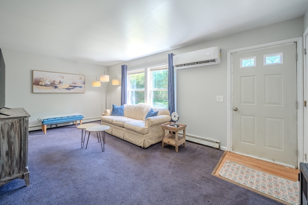 66 Great Road Shirley, MA 01464 - Photo 15 of 40 a living room with furniture and a window