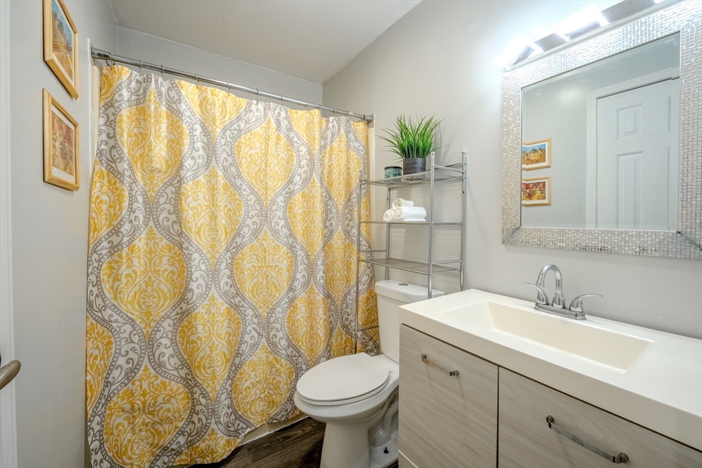 66 Great Road Shirley, MA 01464 - Photo 17 of 40 a bathroom with a sink toilet and shower