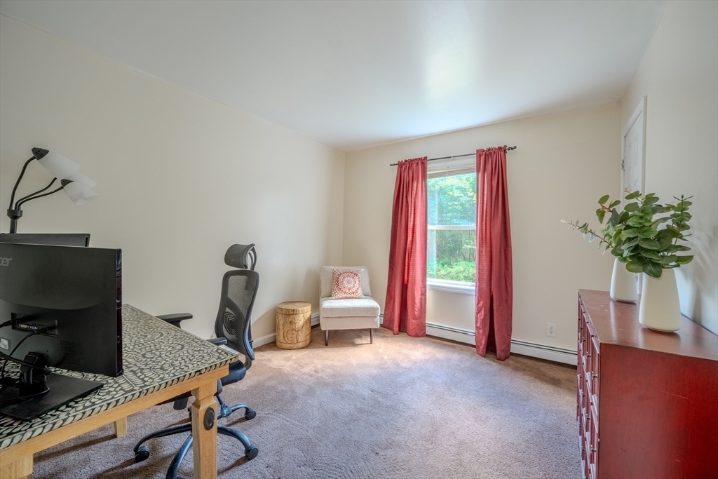 66 Great Road Shirley, MA 01464 - Photo 18 of 40 a view of a workspace with furniture and a window
