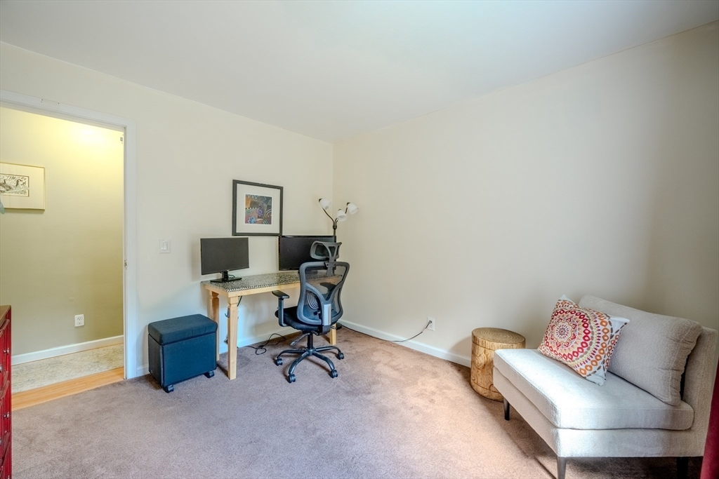 66 Great Road Shirley, MA 01464 - Photo 19 of 40 a view of a workspace with a couch