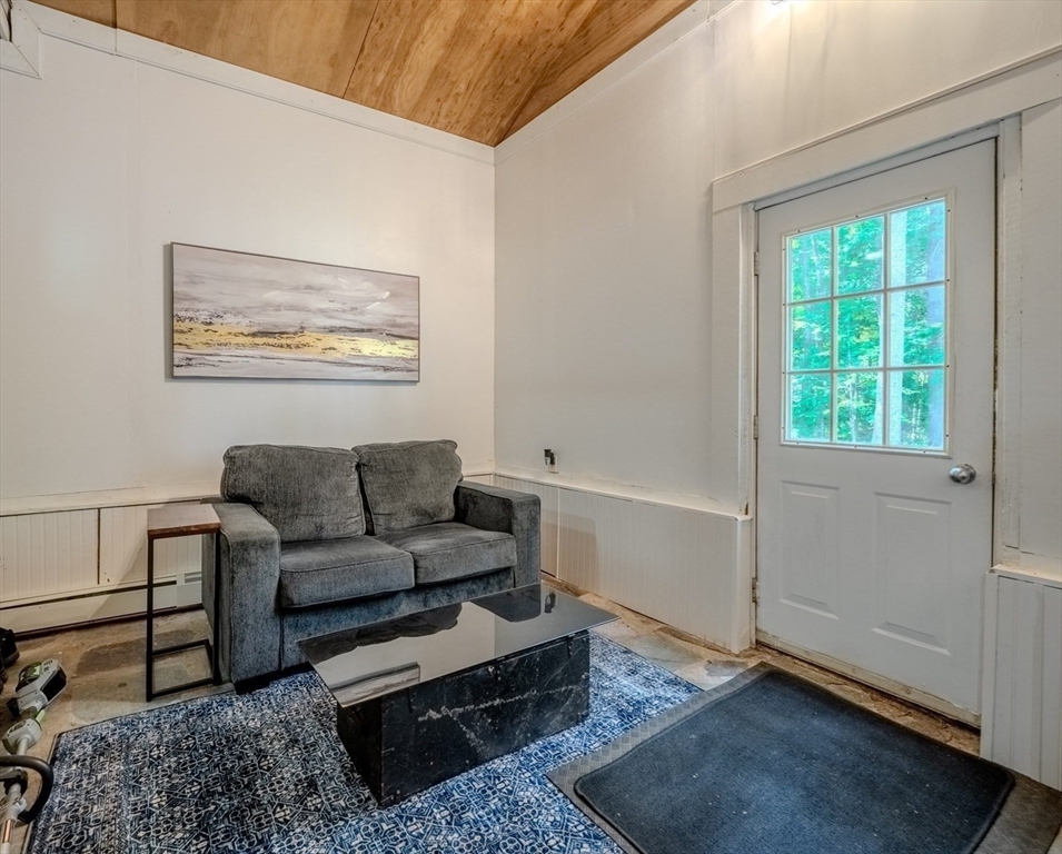 66 Great Road Shirley, MA 01464 - Photo 21 of 40 a living room with furniture and a window