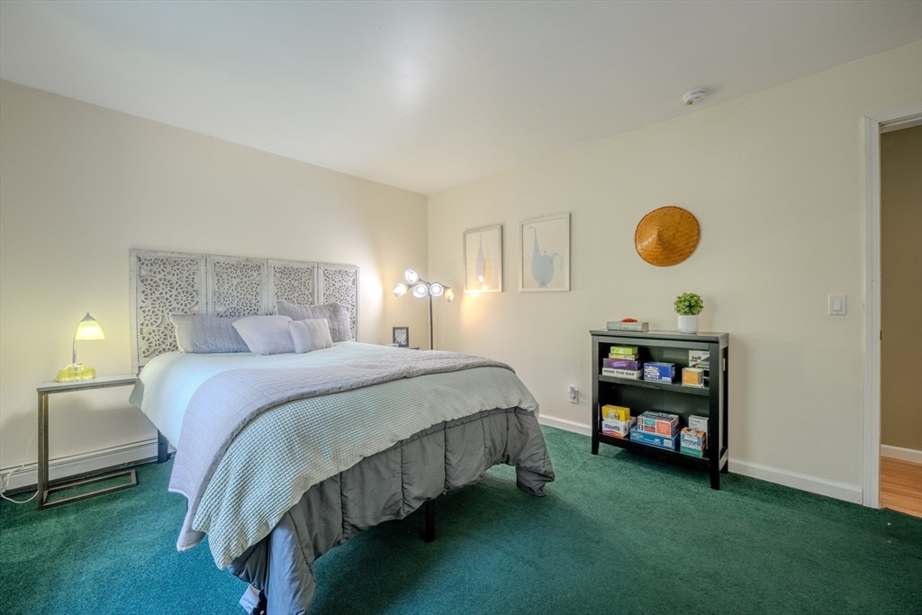 66 Great Road Shirley, MA 01464 - Photo 26 of 40 a bedroom with a bed and a window
