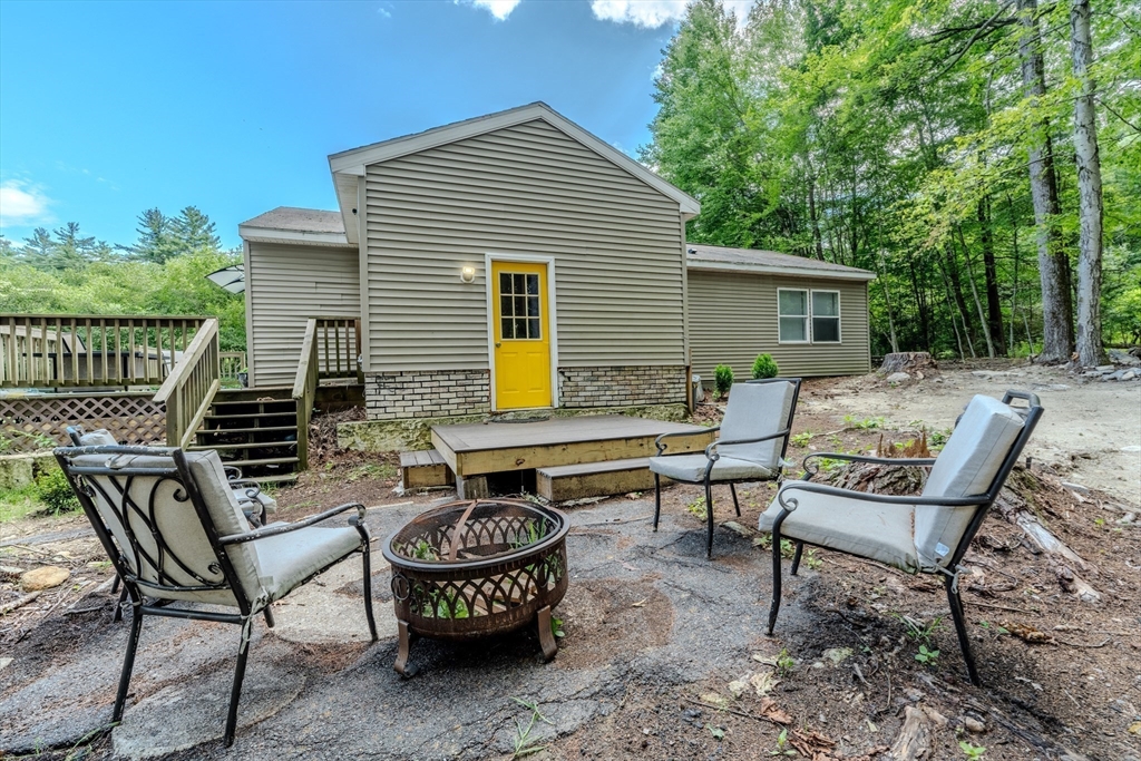 66 Great Road Shirley, MA 01464 - Photo 33 of 40 a view of a house with backyard and sitting area