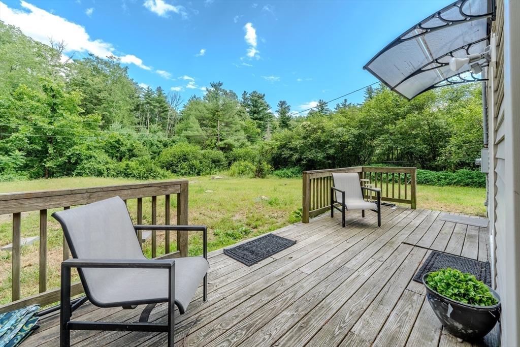 66 Great Road Shirley, MA 01464 - Photo 34 of 40 a view of a chairs in patio of a house