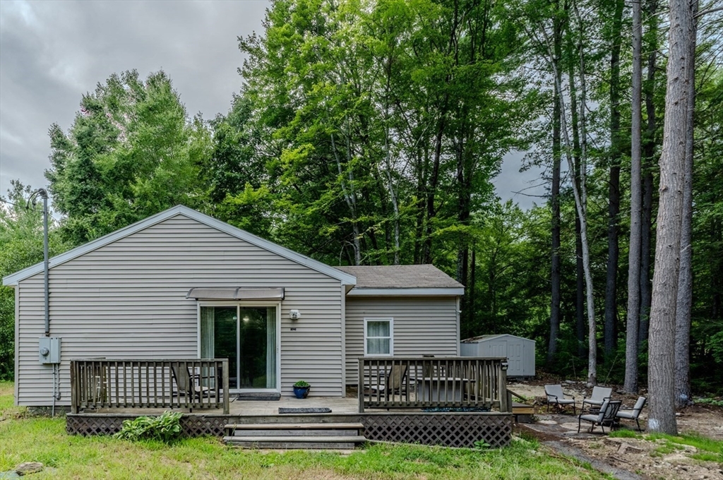 66 Great Road Shirley, MA 01464 - Photo 35 of 40 a view of house with a yard and a garden