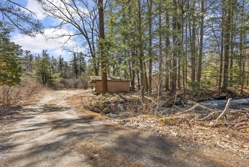 66 Great Road Shirley, MA 01464 - Photo 40 of 40 a view of outdoor space with trees