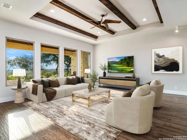 a spacious bathroom with a tub sink and mirror
