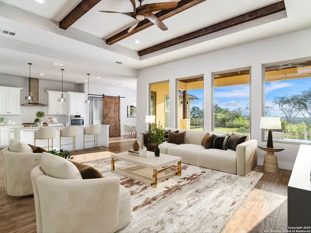 a spacious bathroom with a granite countertop tub sink and mirror
