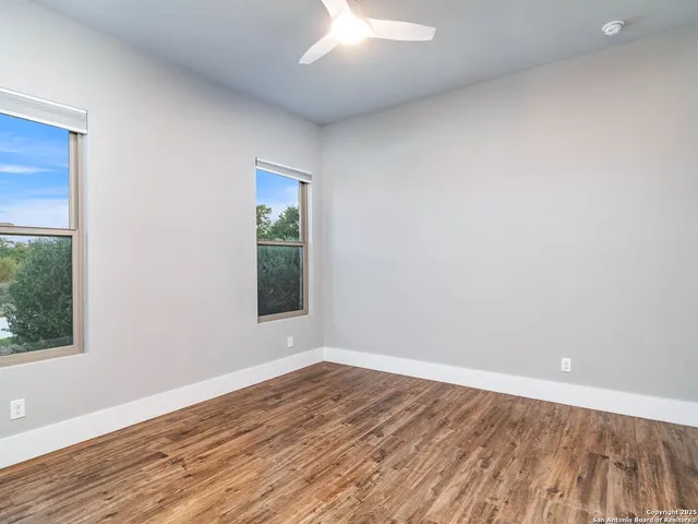 front view of a house with a garden