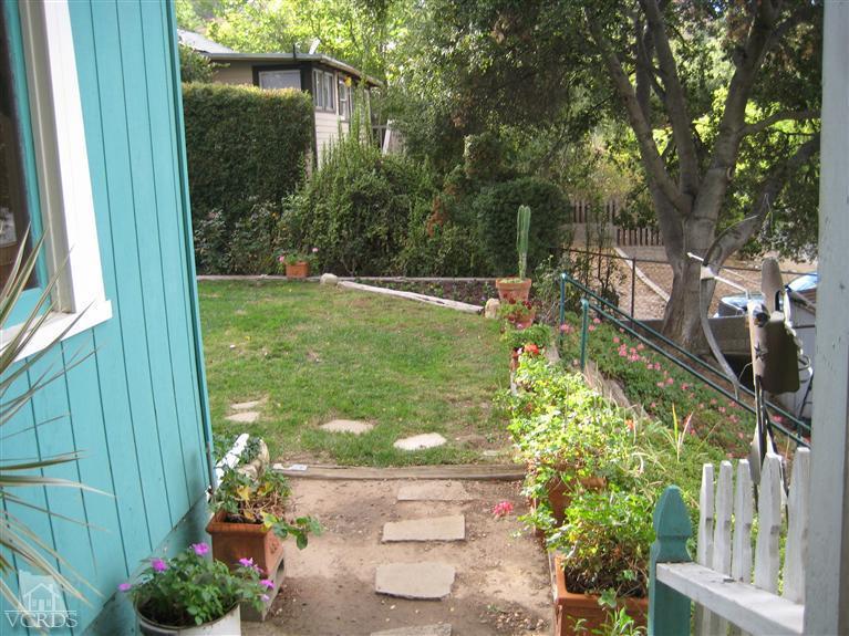 771 Katherine Road Simi Valley, CA 93063 - Photo 14 of 26 a backyard of a house with lots of green space