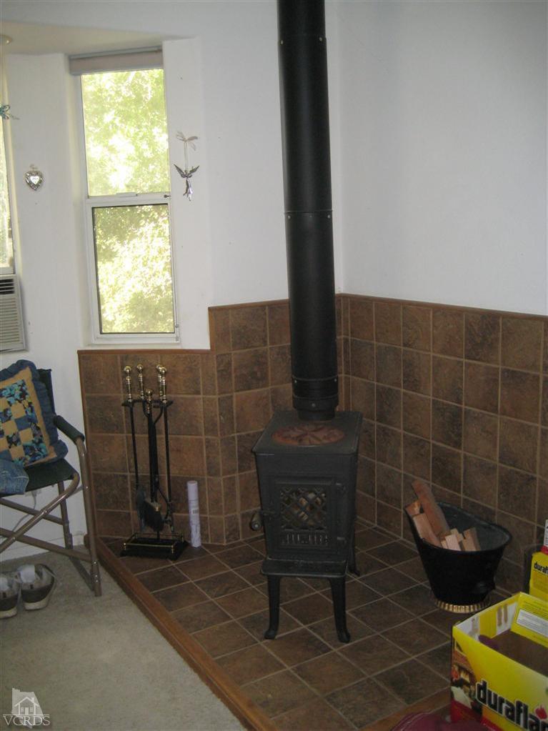 771 Katherine Road Simi Valley, CA 93063 - Photo 3 of 26 a bathroom with a toilet and a sink