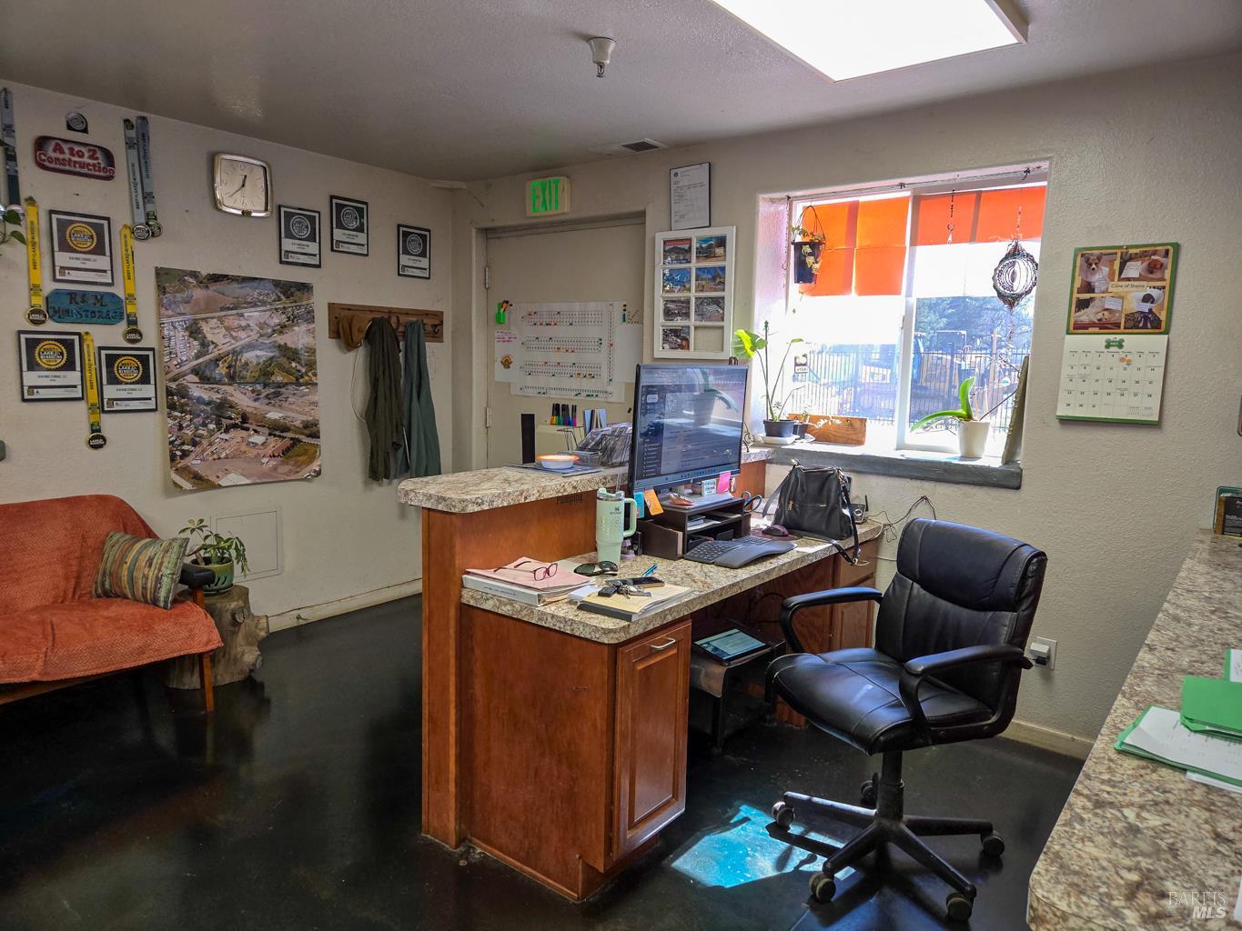 4300 North State Street Ukiah, CA 95482 - Photo 11 of 22 a view of a workspace with furniture and a window