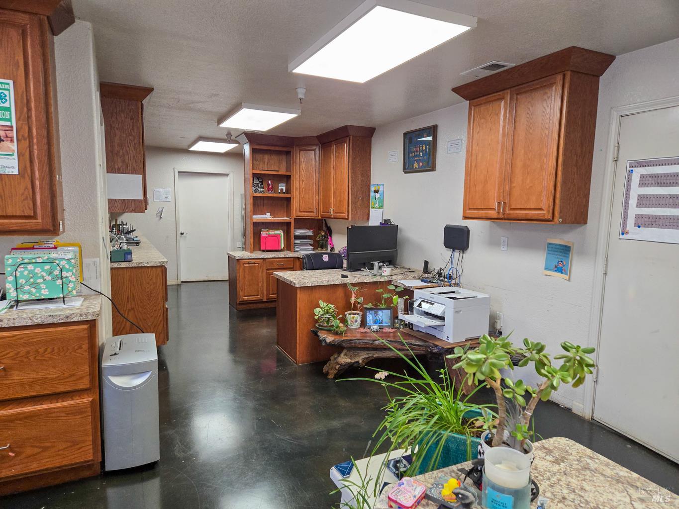 4300 North State Street Ukiah, CA 95482 - Photo 12 of 22 a work room with furniture and a potted plant