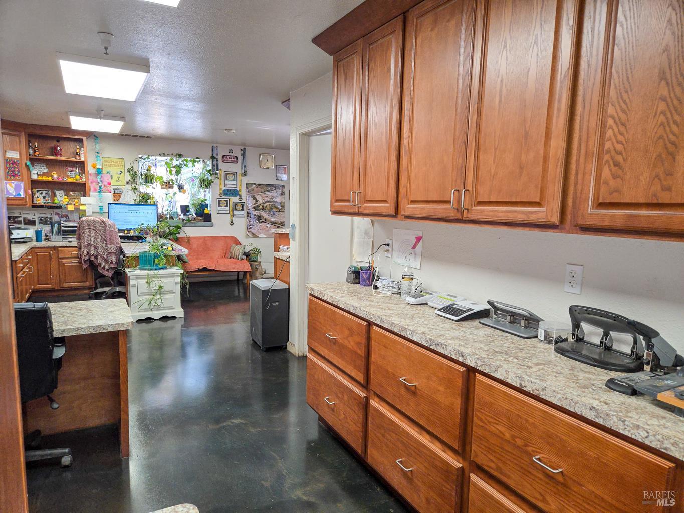 4300 North State Street Ukiah, CA 95482 - Photo 16 of 22 a kitchen with stainless steel appliances granite countertop a sink stove and cabinets
