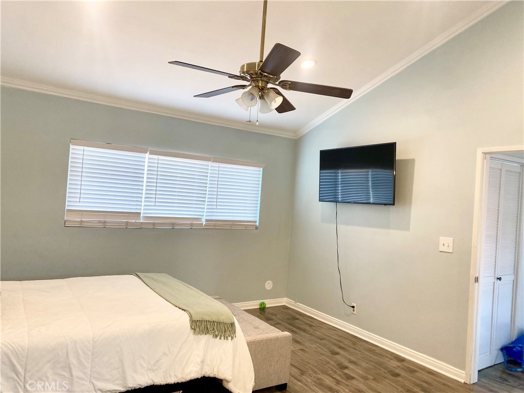 1450 West 146th Street, Unit 2 Gardena, CA 90247 - Photo 18 of 33 a bedroom with a bed and a window