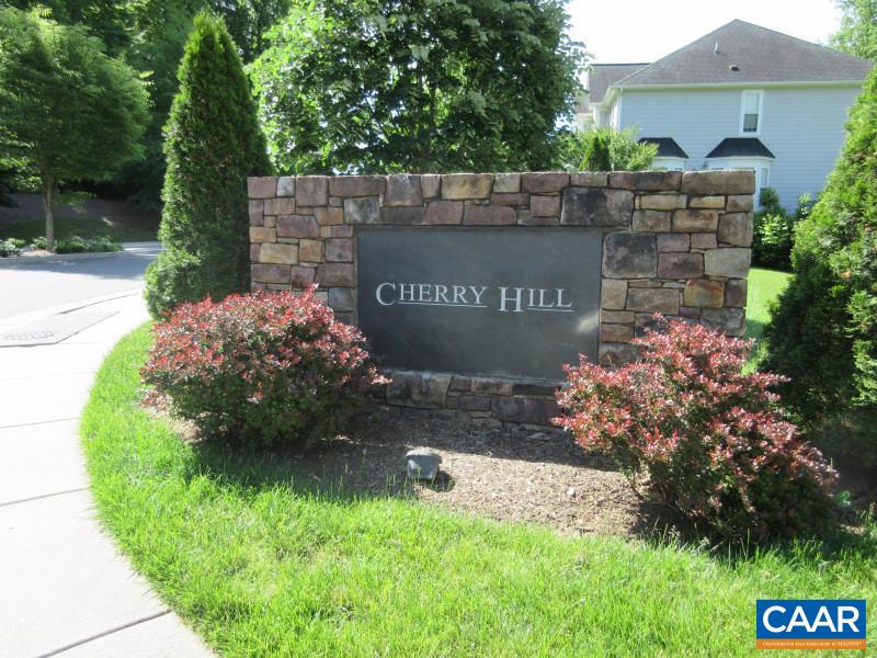 912 Rainier Road Charlottesville, VA 22903 - Photo 2 of 15 a sign that is sitting in front of flowers