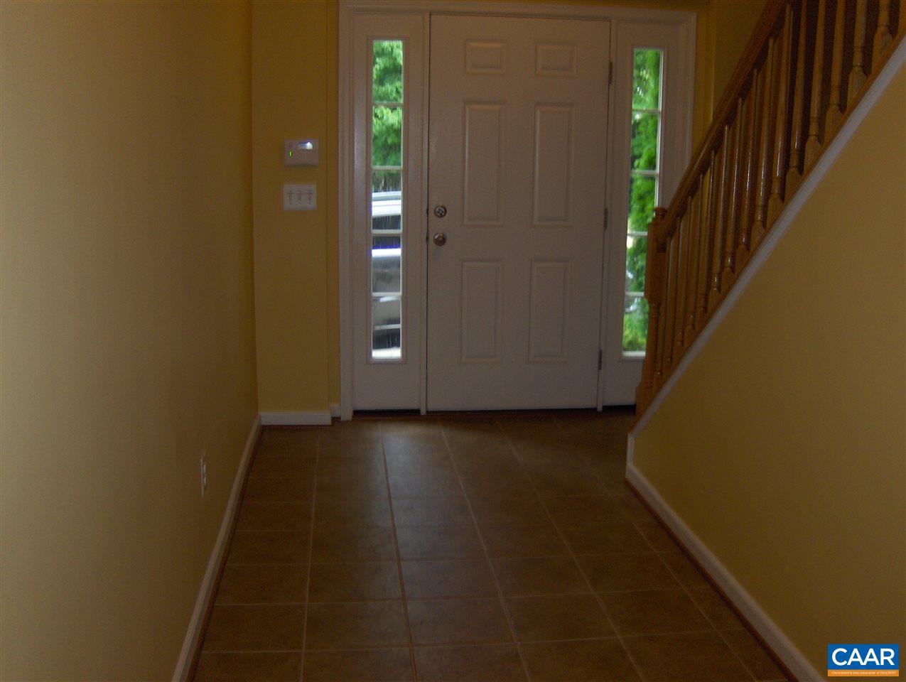 912 Rainier Road Charlottesville, VA 22903 - Photo 8 of 15 a view of a hallway with wooden floor