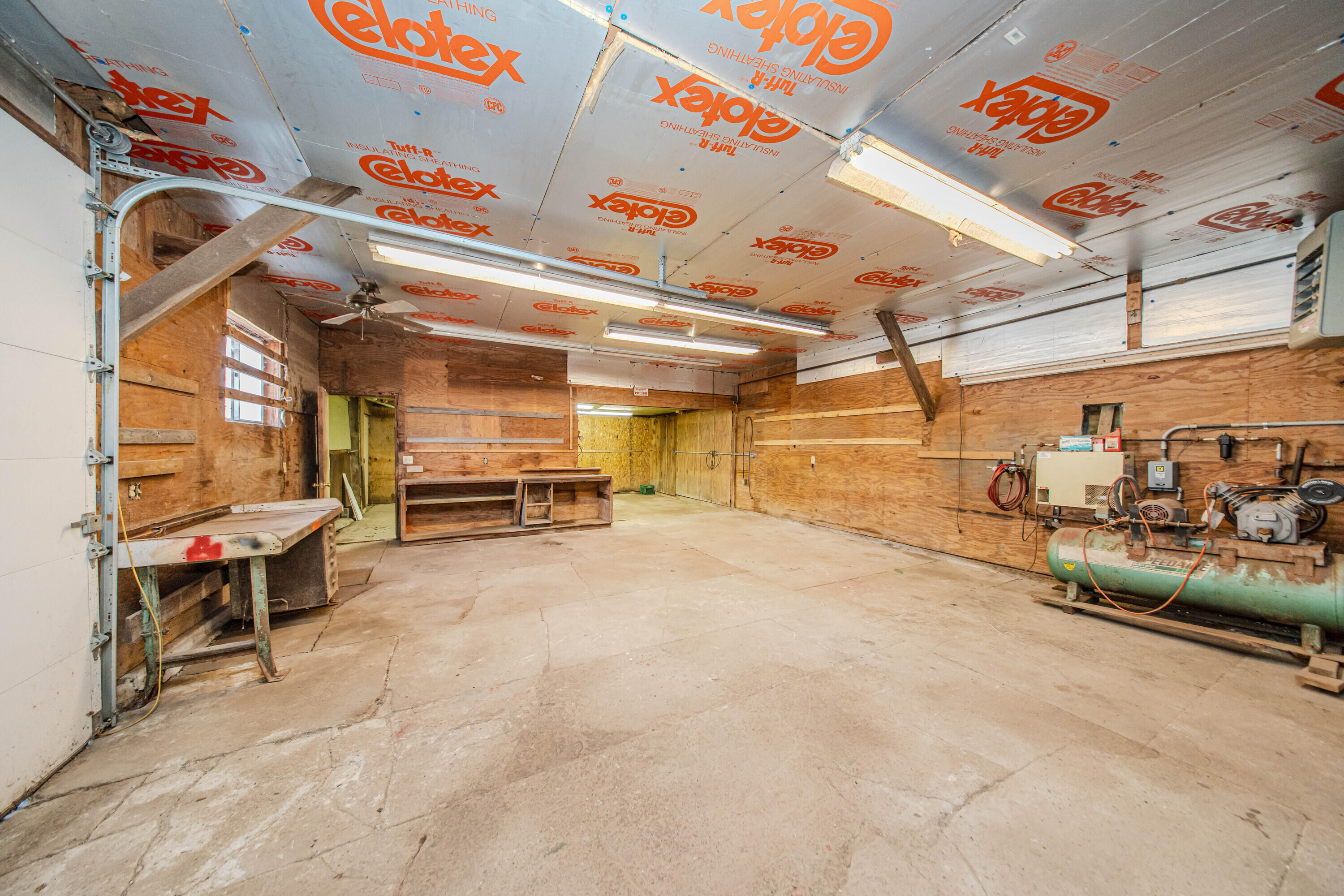 7130 Platt Road Saline, MI 48176 - Photo 64 of 77 Red Metal Shed w air compressor