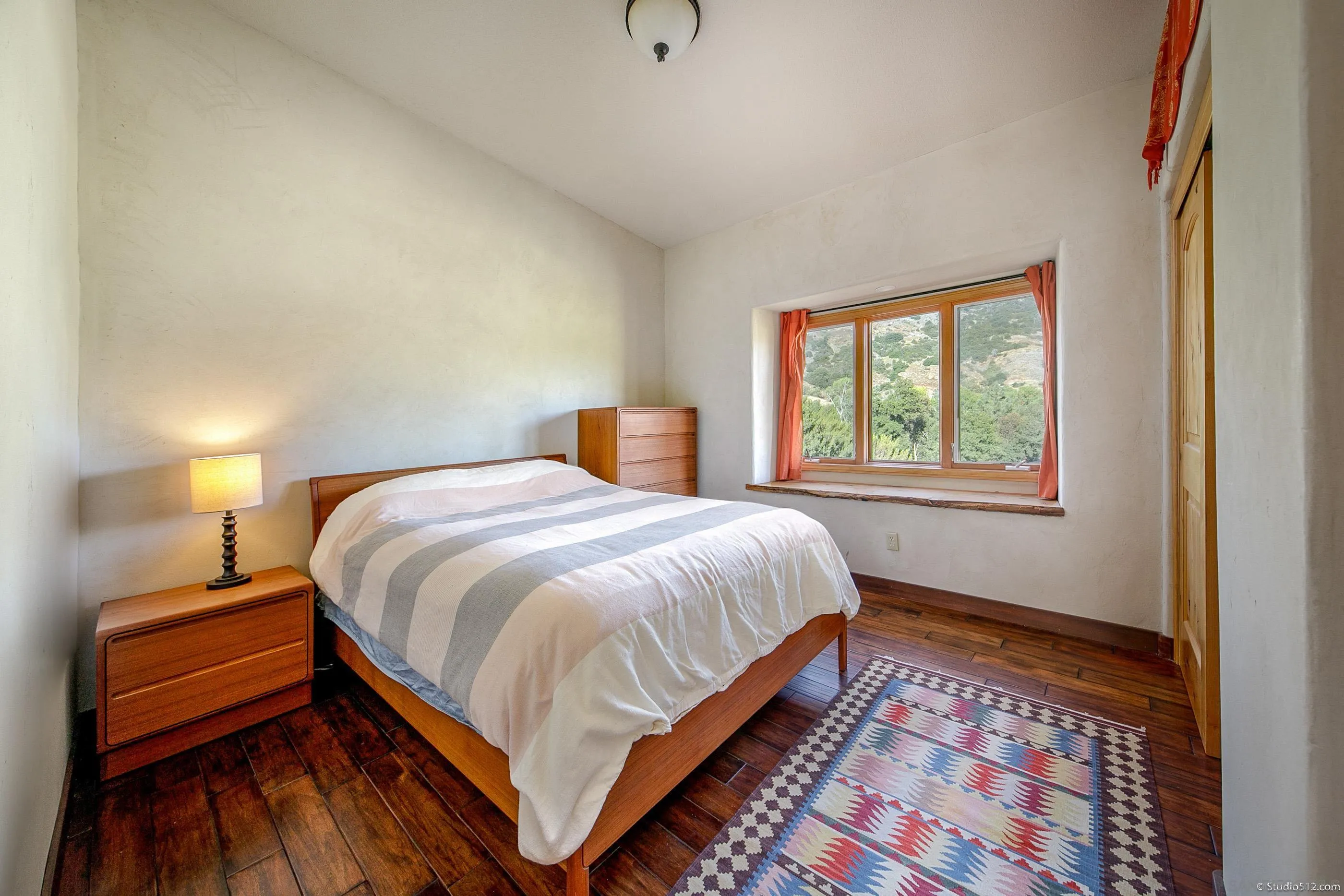 1861 Wynola Road Julian, CA 92036 - Photo 36 of 75 a bedroom with a bed and window