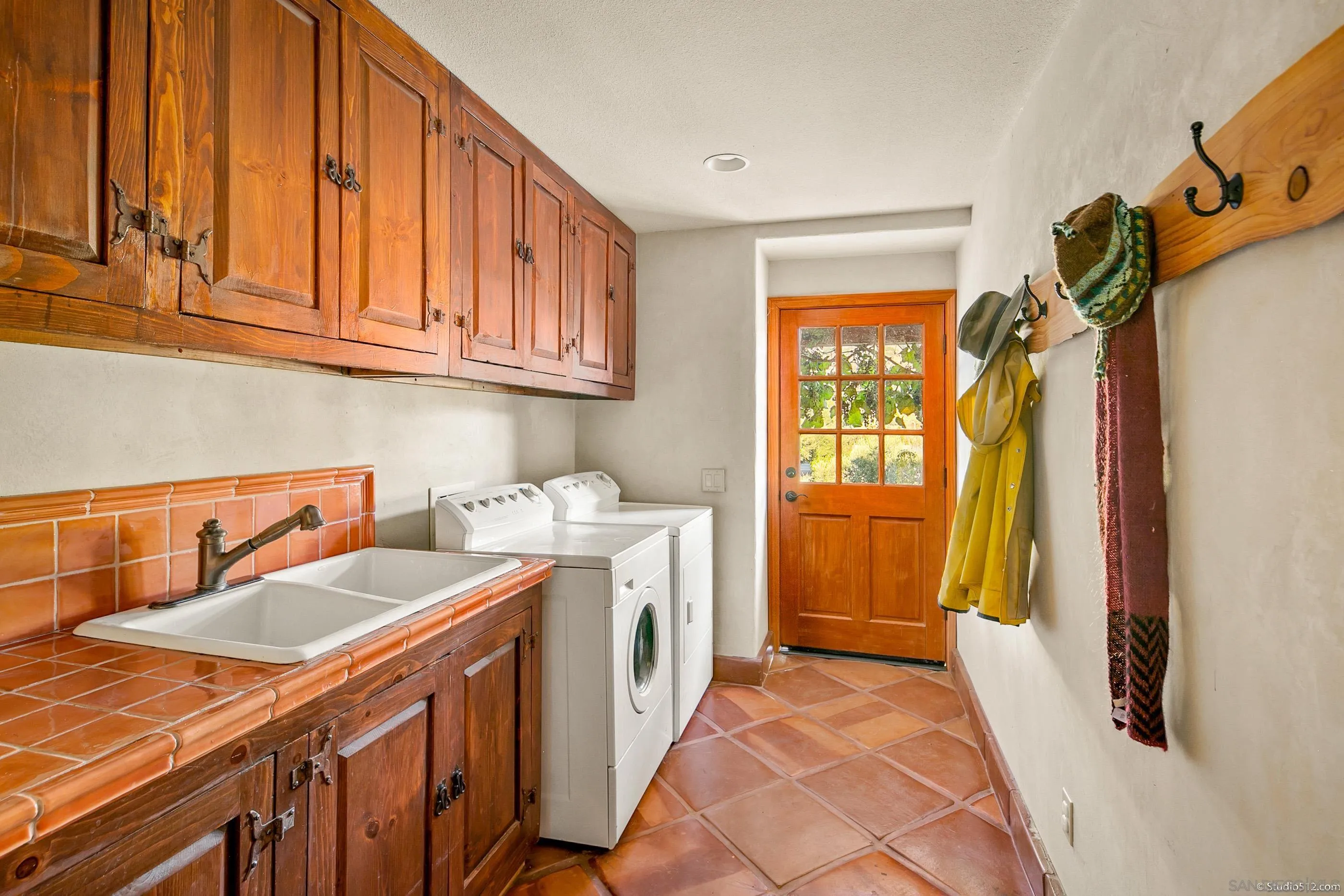 1861 Wynola Road Julian, CA 92036 - Photo 42 of 75 a utility room with sink dryer and washer