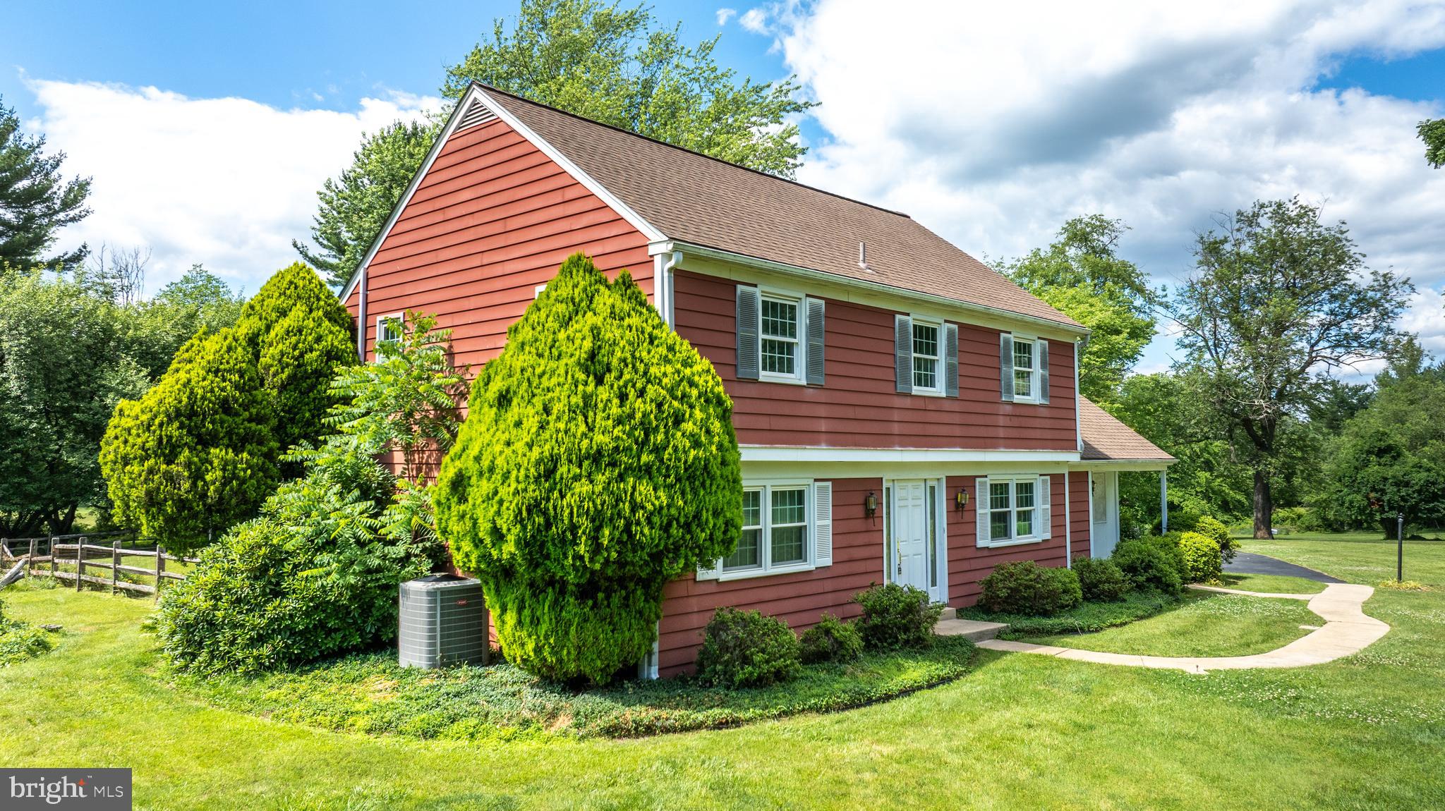 1929 Hillendale Road Chadds Ford, PA 19317 - Photo 3 of 56 a front view of a house with a yard