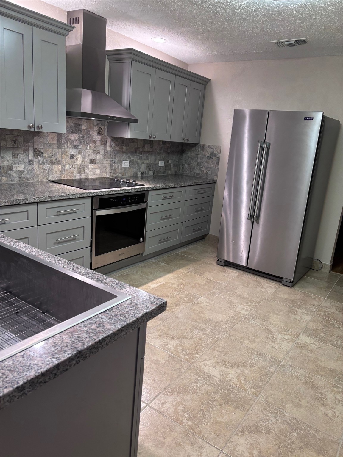 11433 Sabo Road Houston, TX 77089 - Photo 9 of 19 Another view of the kitchen, showing some of a coveted farmhouse sink.