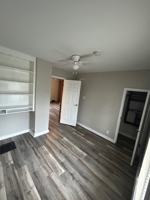 518 College Avenue, Unit 2 DeKalb, IL 60115 - Photo 2 of 13 a view of an empty room and a window