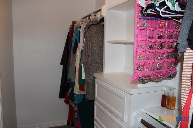 3009 Lenora Drive Victoria, TX 77901 - Photo 13 of 25 a bathroom with a sink vanity and tub