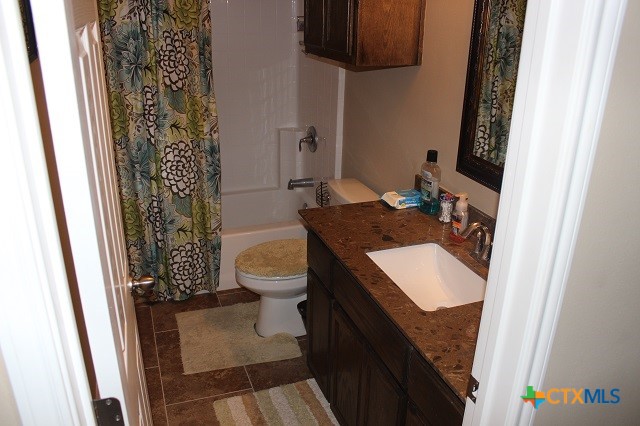 3009 Lenora Drive Victoria, TX 77901 - Photo 15 of 25 a bathroom with a sink and toilet